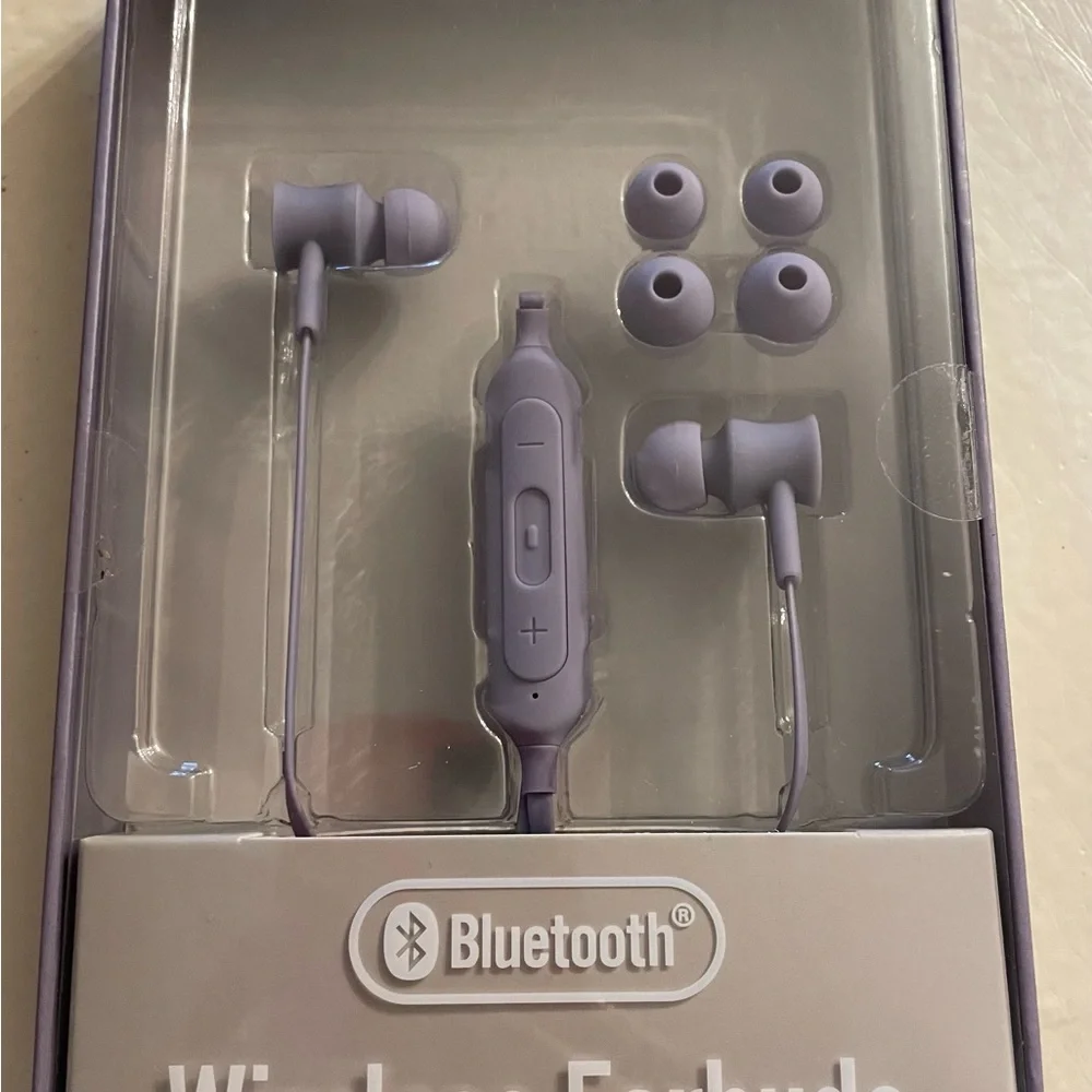 Wireless Bluetooth Earbuds in Purple-Brand New. Sealed.